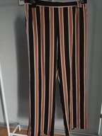 trend one 44 spodnie dżinsowe materiałowe chinos na gumie wzorek paski