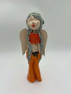 150. Anioł ceramiczny nr 14 w pomarańczowych spodniach 29 x 10 cm