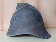 Stary mosiężny hełm strażacki.