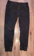 Spodnie jeans joggery CROPP 34/32