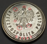 50 gr groszy 2023 DESTRUKT awers rozlane kleksy przy dacie i znaku men.