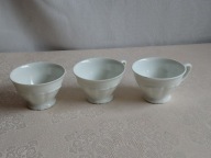 Trzy stare filiżanki Bogucice w kolorze białym