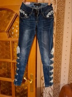 Jeansy z koronką o kokardkami rozm 34