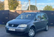Volkswagen Touran Volkswagen Touran 1.6 b OC DO 09.26 PRZESTRONNY Zamia