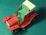 Stary samochód z napędem mechanicznym -blaszana zabawka z PRL