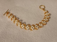 Śliczna bransoletka z białych pereł w formie kwiatuszków 18,5 cm