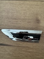 EMBLEMAT LISTWA BŁOTNIKA LEWA R-LINE 5NA853688A VW TIGUAN II