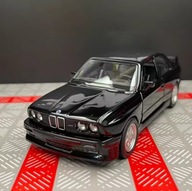 Zabawka model samochodu klasyk czarne BMW E30 M3 w skali 1:36