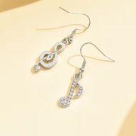 KOLCZYKI KWIATY KWIATAMI KLUCZ WIOLINOWYBOHO NUTKI festiwal muzyczny