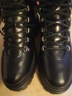 Czarne skórzane ocieplane kożuchem naturalnym na grubej podeszwie