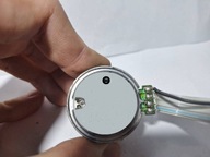 Silnik szczotkowy MMI-6H9LWS 9 V DC dwubiegowy lewy używany 23-9-5