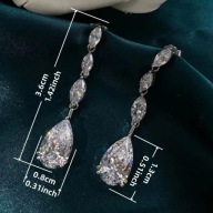 KOLCZYKI DŁUGIE WISZĄCE DIAMENTY DIAMENTAMI SEXY łezki łezkami plater biały