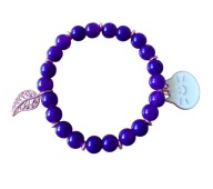 Bransoletka ze szklanych koralików z kotem i listkiem