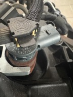 Caddy wtryskiwacz 04L130277AC układ wtryskowy