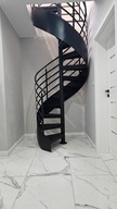 Schody spiralne na słupie- balustrady kute