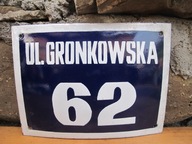 Stara emaliowana tablica z numerem domu i ulicą