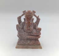 Rzeźba z kamienia - hinduski Bóg Ganesha siedzący na cokole - ręczna praca