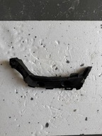 Uchwyt mocowanie wspornik zderzaka ślizg tył lewy Toyota Aygo X 52575-0H050