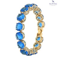 76310 BRANSOLETKA 18K POZŁACANA 16,5 CM 10 MM niebieskie kryształy