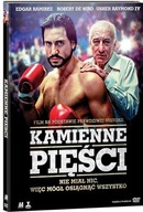 kamienne pięści z książką De NIro
