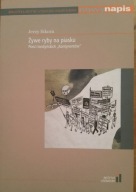 Żywe ryby na piasku Jerzy Sikora