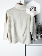 Kremowy wełniany sweter z golfem Frapp gruby splot oversize 50% wełna L 40