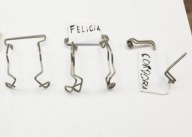 SPRĘŻYNKA MOCOWANIE UCHWYT DRUT ŻARÓWKI H7 H1 FELICIA POLO PASSAT CORDOBA