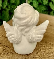 Szwajcarska Porcelanowa świąteczna figurka Aniołek zamyka oczy