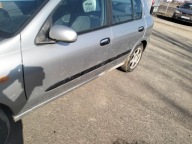 Drzwi Nissan Almera N16 szyba klamka mechanizm podnoszenia Lampa