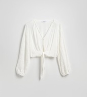 Biała ażurowa bluzka z ozdobnym wiązaniem Reserved 38 M