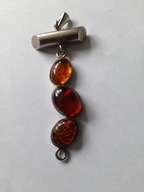 Stary srebrny wisior z bursztynami