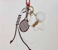 Brelok z motywem psa i rakiety tenisowej