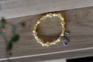 Żółta bransoletka z kotkiem x Fundacja KOT