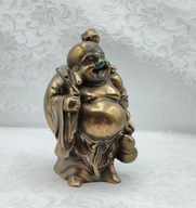 Szczęśliwy BUDDA z workiem na placach powłoka jak brąz