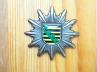 Odznaka na czapkę policji. Saksonia.