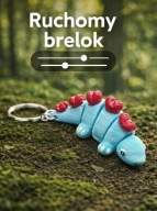 Brelok 3D Dinozaur ręcznie malowany,ruchomy Kolor Cyan