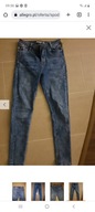 Spodnie damskie jeans r 38 marmurek push up
