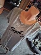 Bluzka jasno niebieska z napisem Smile.