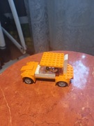 Własnoręczny robiony samochód z lego/lego+dotego ludziki lego i 