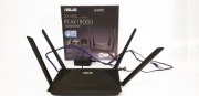 Router RT-AX1800U pracujący w standardzie Wi-Fi 6, nowy.