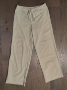 kremowe spodnie Nike L 40/42