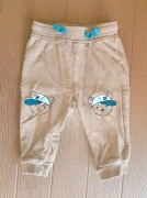 29. Beżowe spodnie dresowe misie rozmiar 74