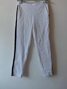 Spodnie białe z czarnymi lampasami roz.M wymiary opis firmy Infiniti 