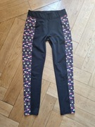 czarne legginsy ze wzorem * Crivit