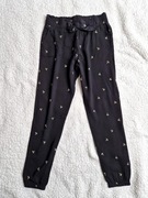 Spodnie w palmy rozm 140 na 9-10 lat