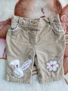 Beżowe ocieplane podszewką sztruksowe spodnie 56 - 62 haft królik w kwiatki