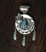 Łapacz snów .Srebrny wisior z turkusem i krukiem.