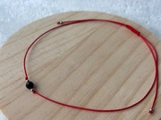 Bransoletka ochronna z kamieniem naturalnym Turmalin na czerwonym sznurku