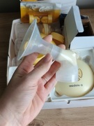 Laktator elektryczny Medela Swing z akcesoriami + butelki + smoczek Calma