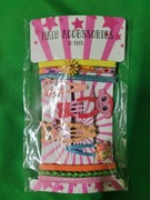 zestaw akcesoriów do włosów marki Sonem,  spinki i gumki do włosów. 